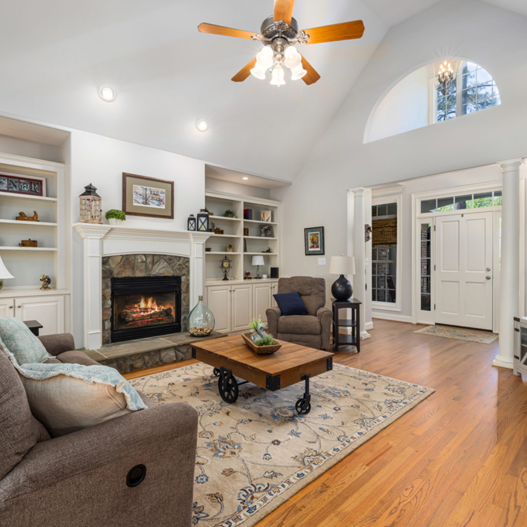 Living room with hardwood floors and fireplace